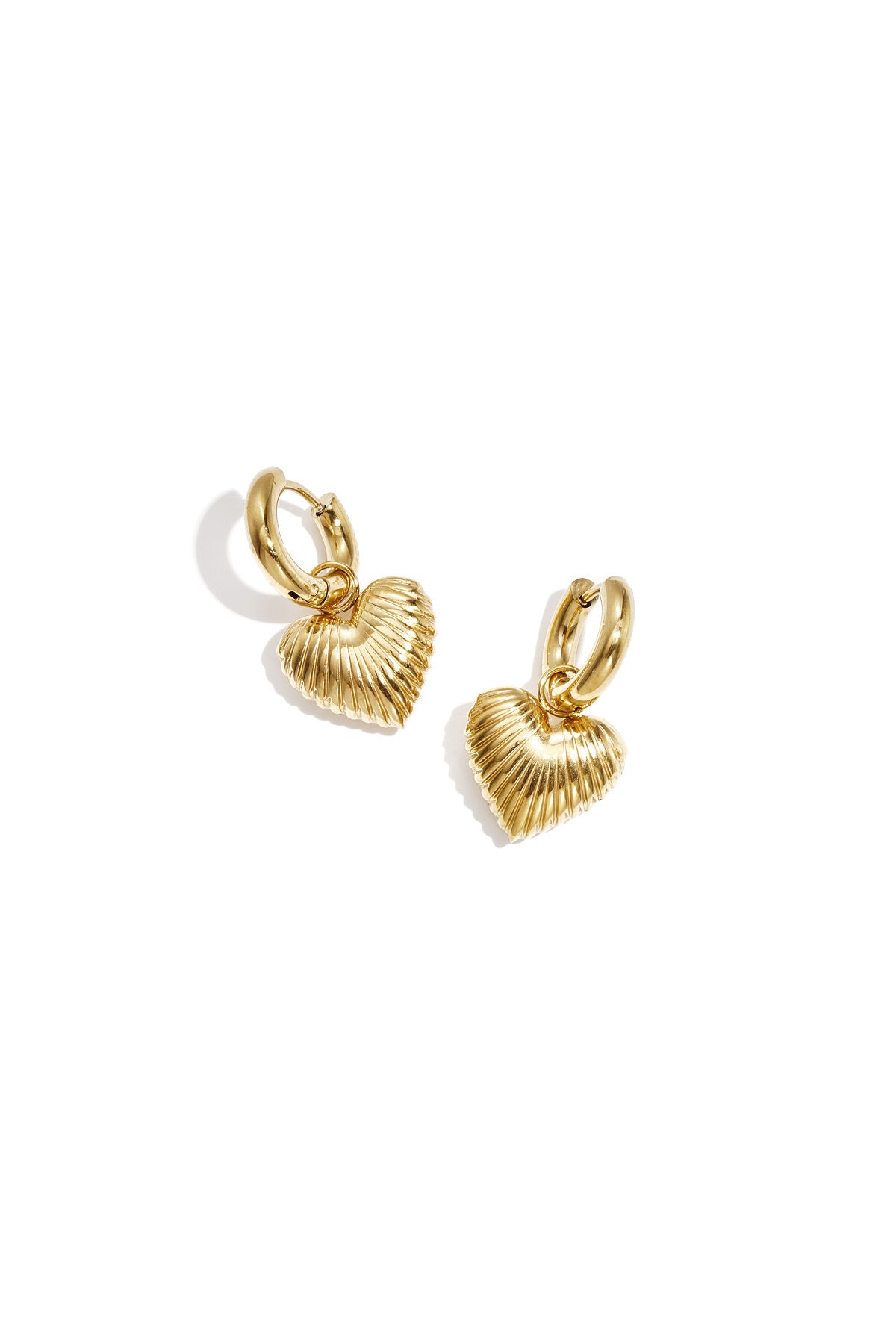 Earrings with radiant heart