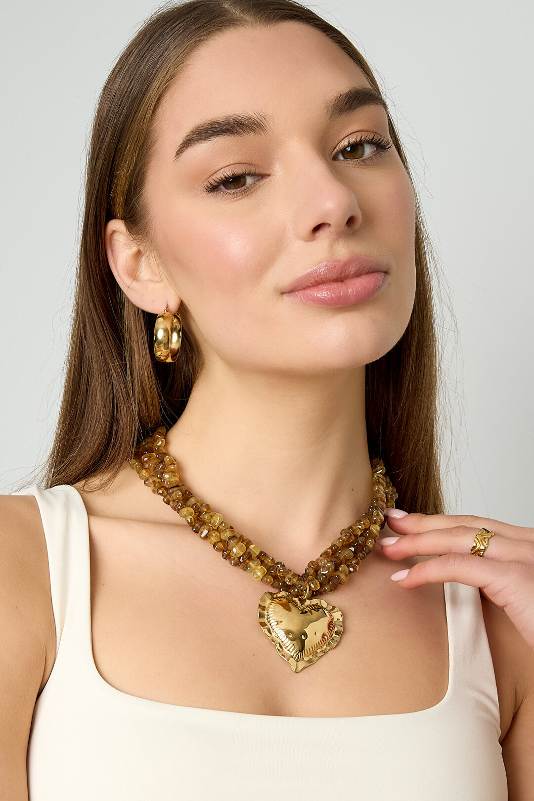 Linked bead necklaces with hanging heart