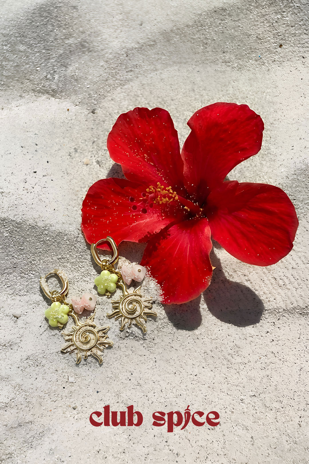Oval hoop earrings with sun and bead charms