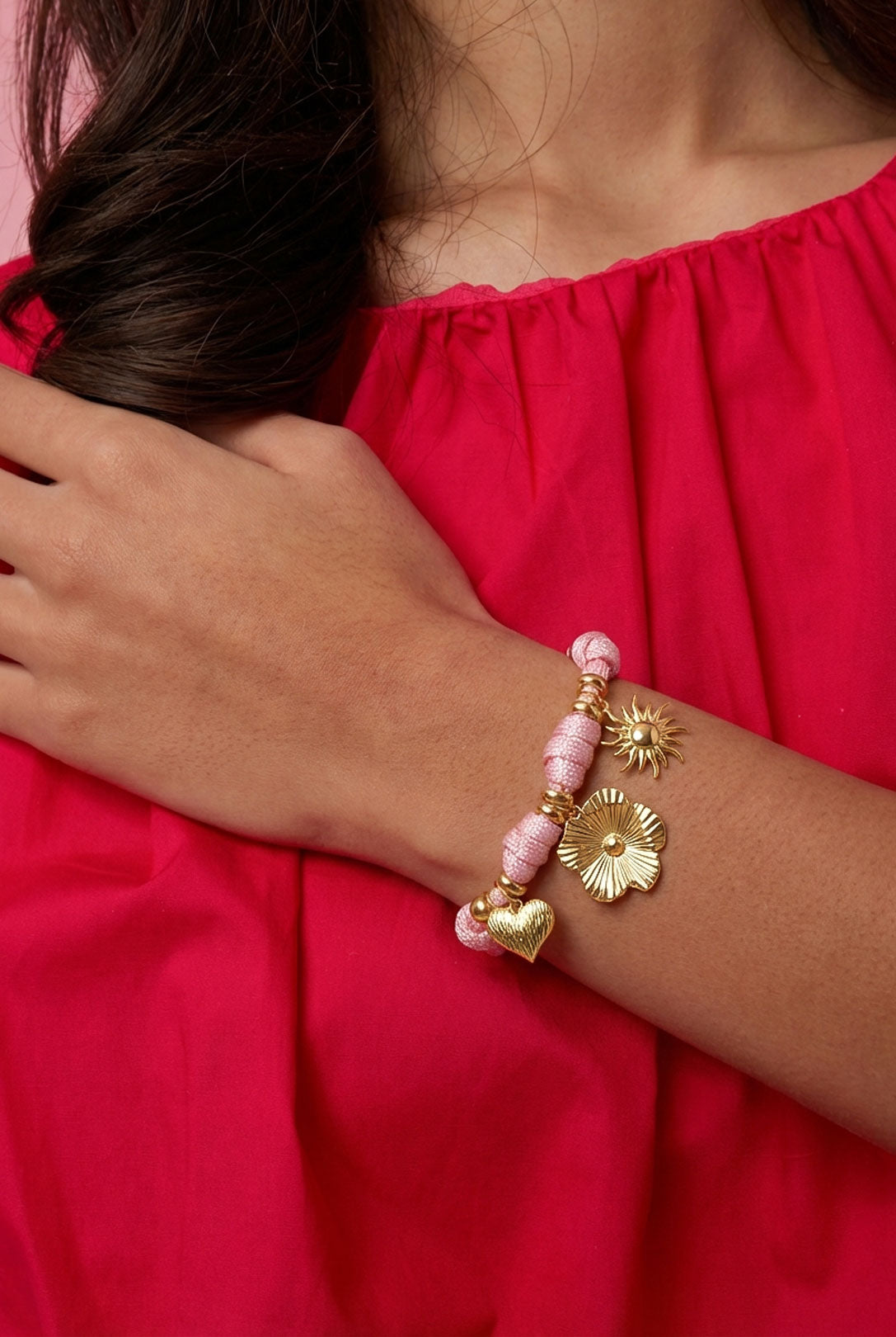 Rope bracelet with knots and various charms